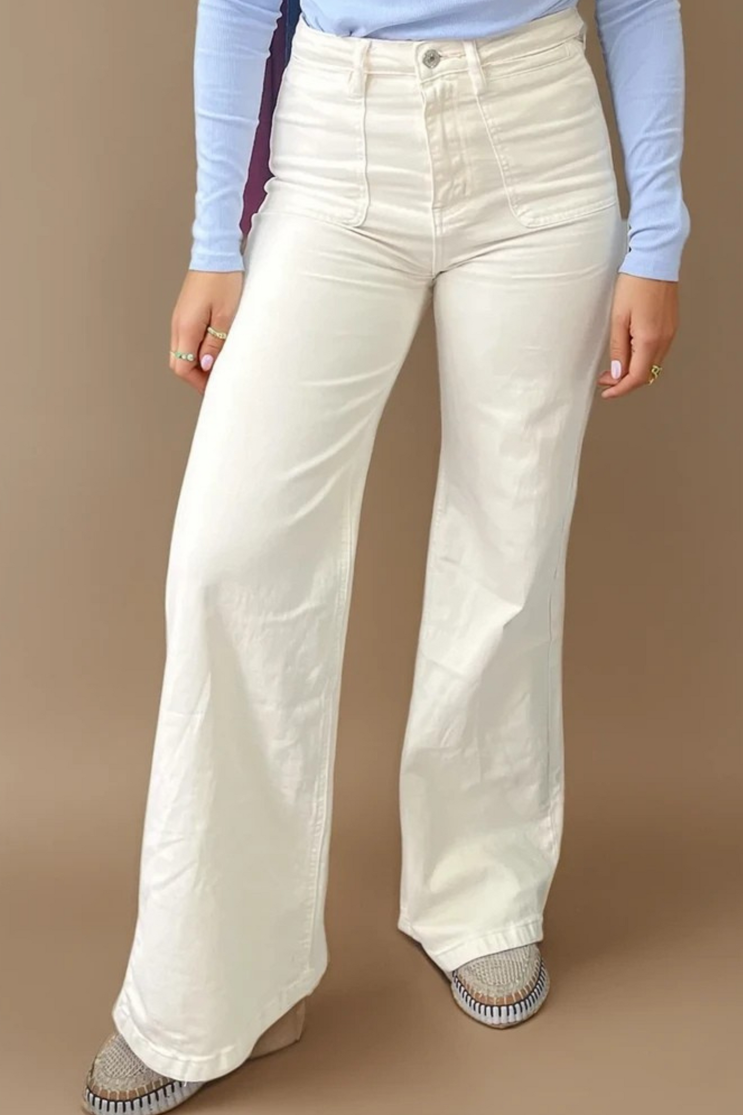 Cream high waisted flare jeans