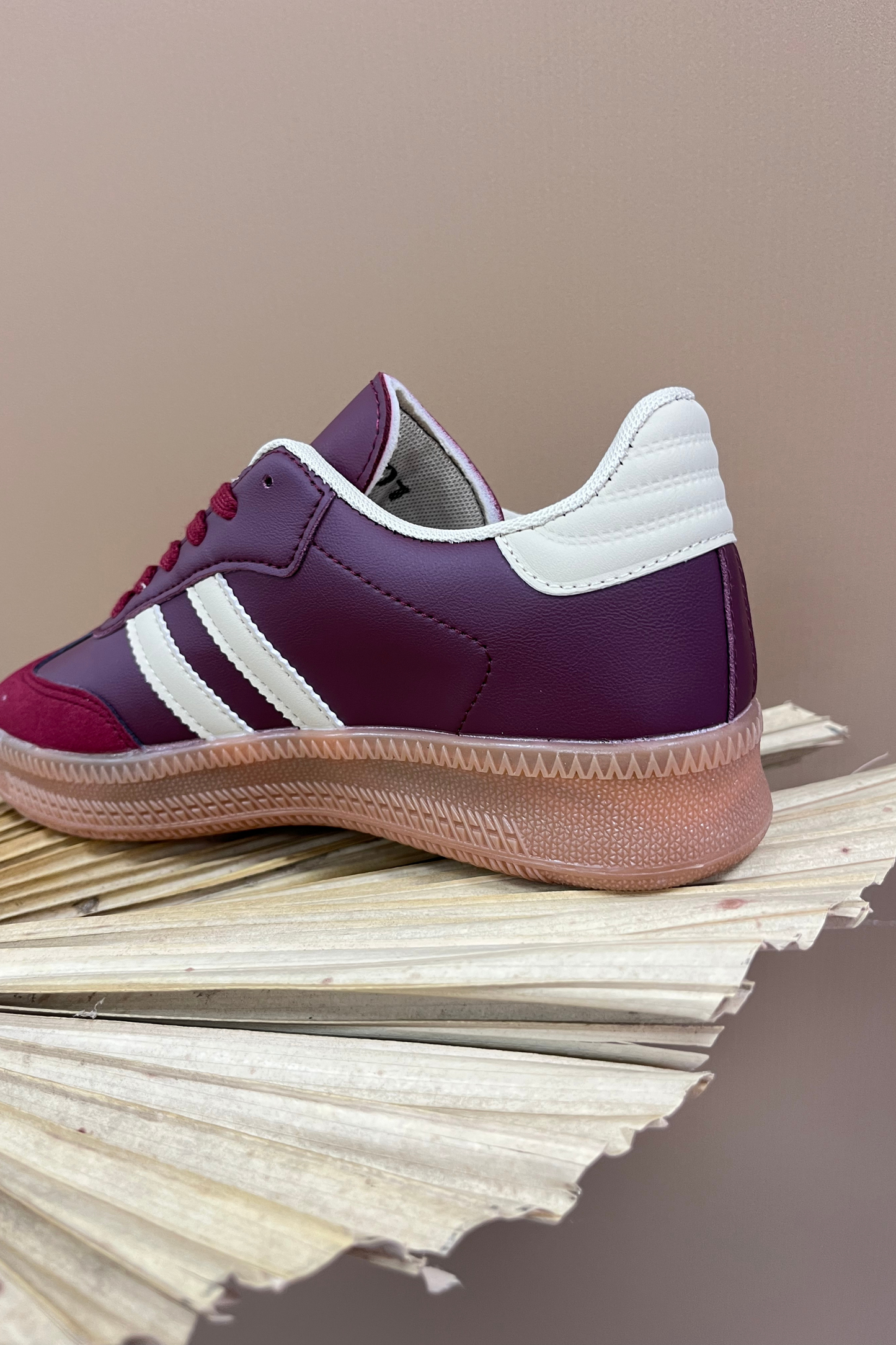 Burgundy lace up trainers