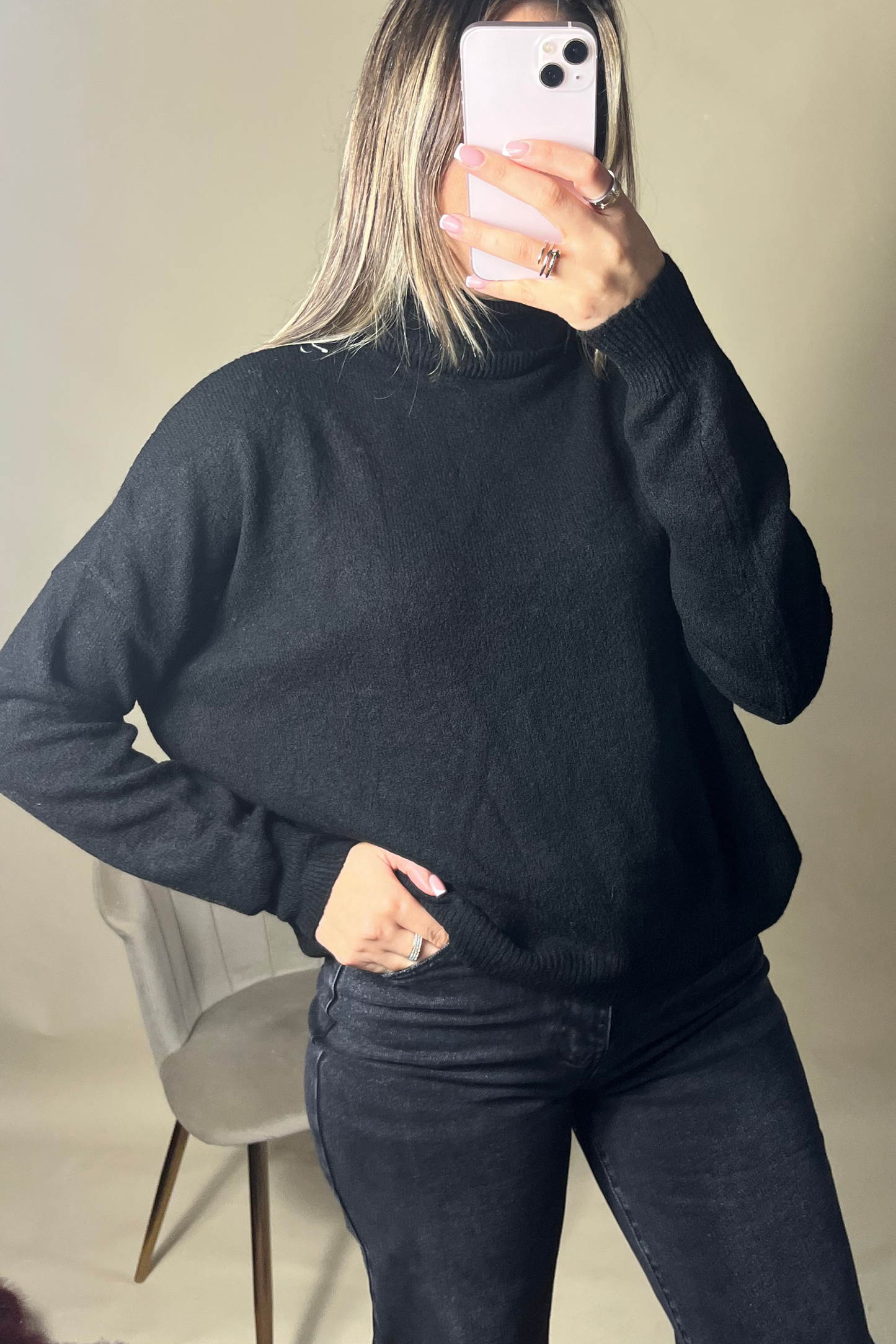 Black relaxed roll neck jumper