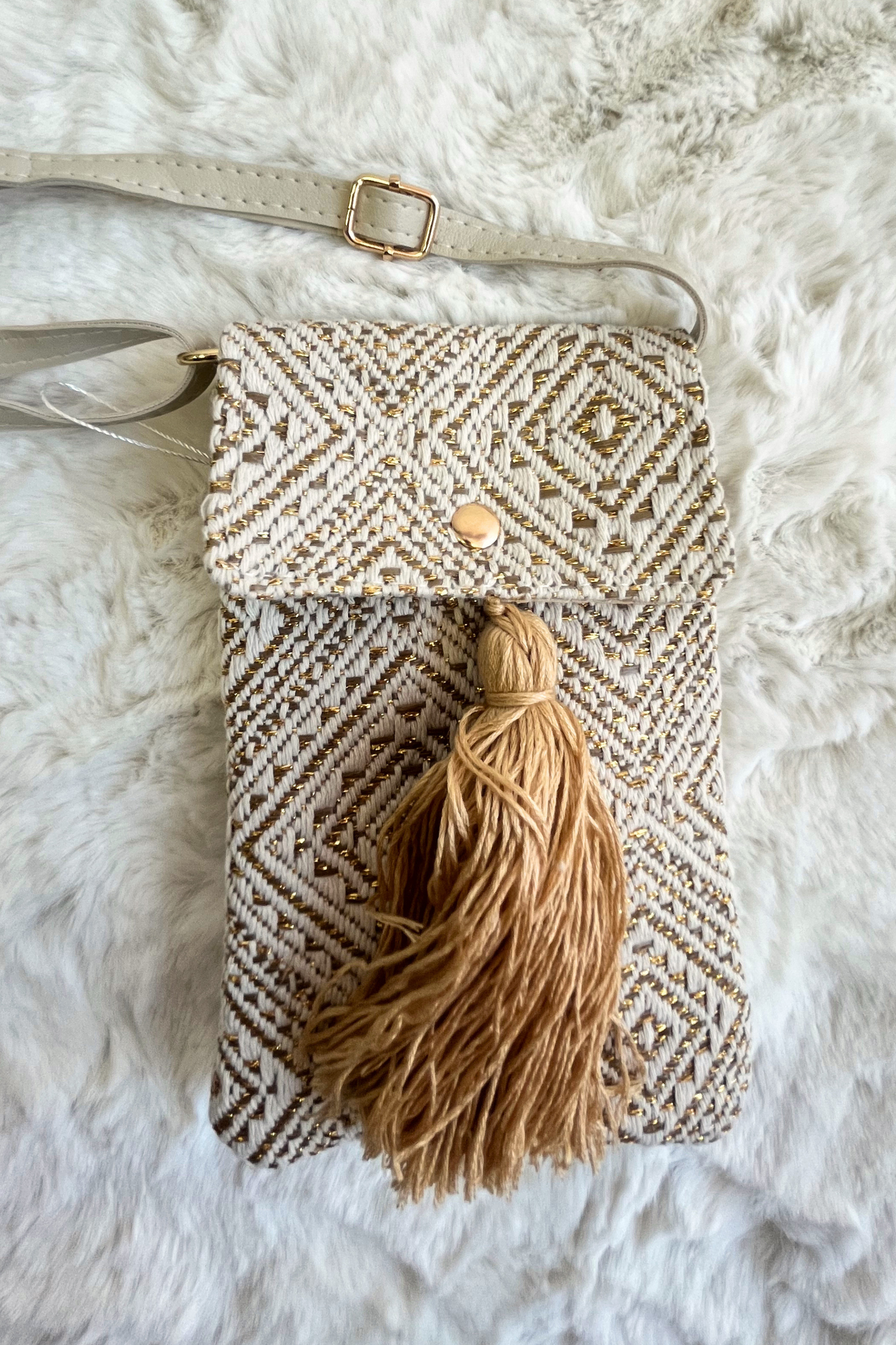Crossbody bag with tassel (Variants)