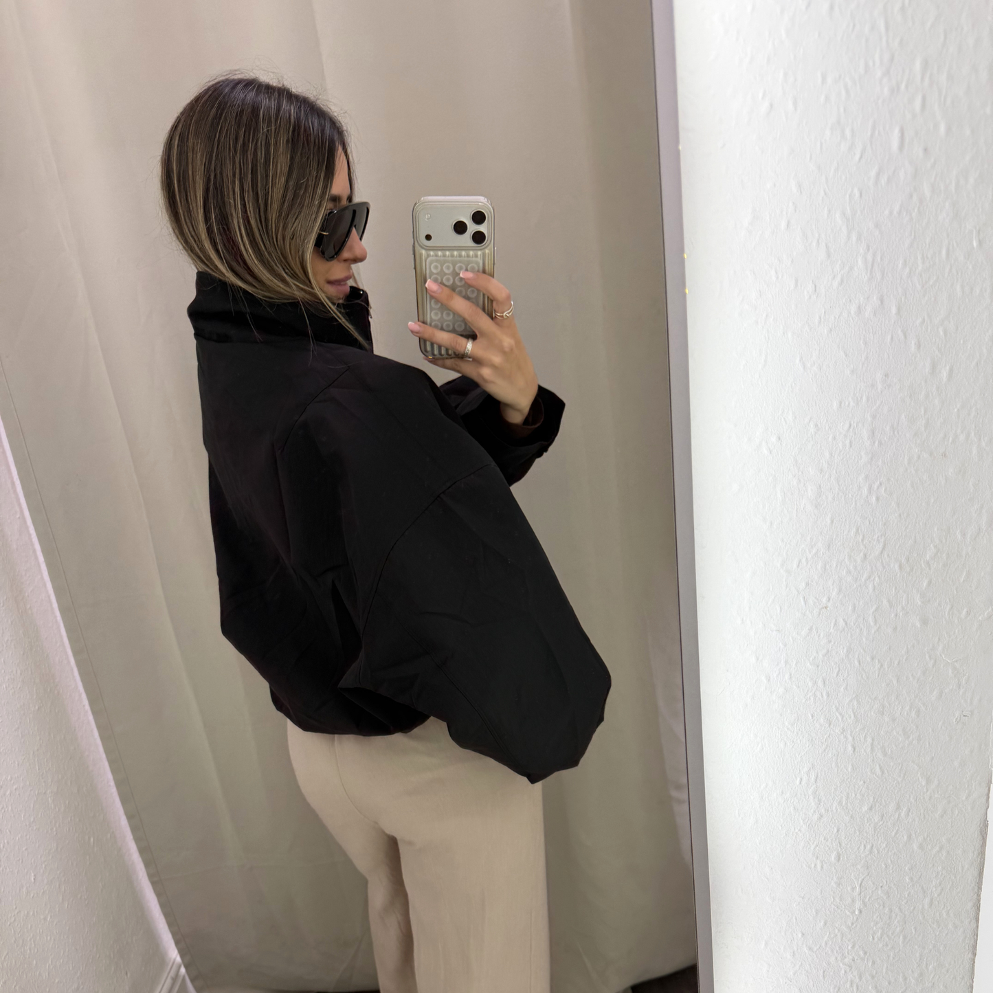 Cropped oversized black windbreaker jacket