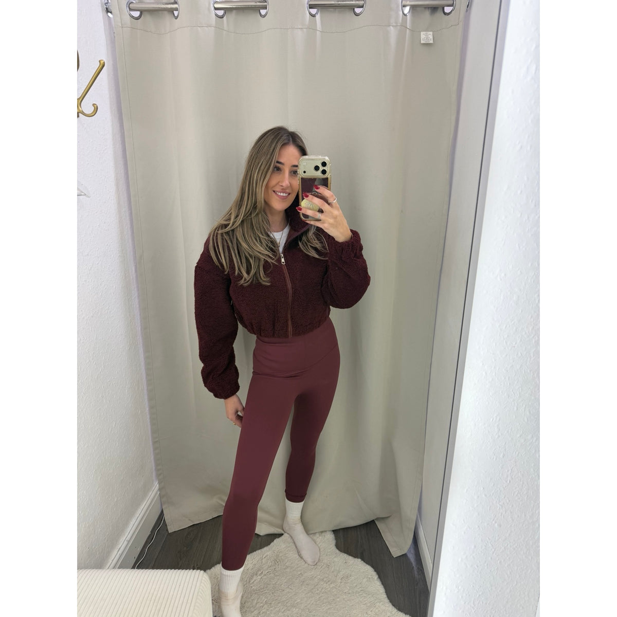 Front view of Plum Energy Leggings and Burgundy Cropped Borg Fleece Jacket at Unscripted boutique