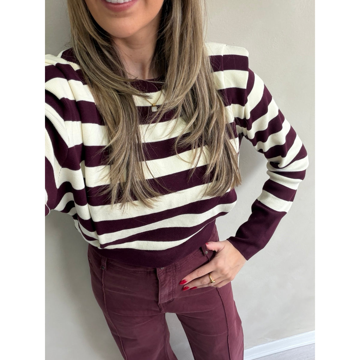 Burgundy and cream striped padded shoulder jumper – close-up of the knit and shoulder detail